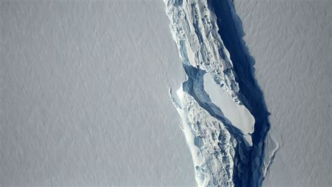 The massive crack in the Antarctic ice shelf is hanging on by a 12-mile ...