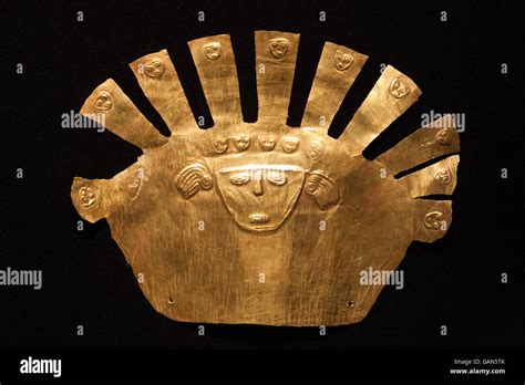 Gold inca mask Stock Photo - Alamy