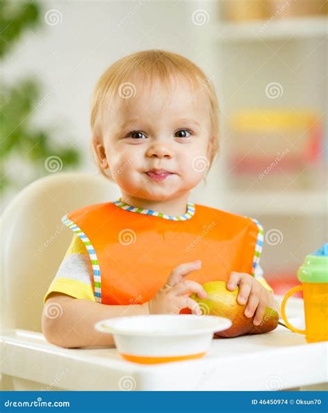 Happy Baby Kid Boy Toddler Eating Itself with Stock Photo - Image of ...