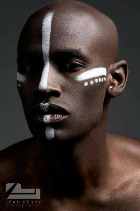 Tribal war paint | Tribal makeup, Tribal face, African face paint