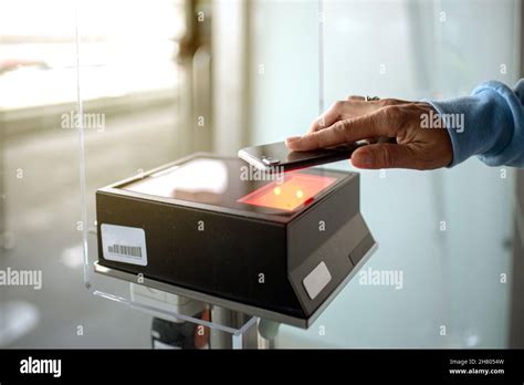 Boarding pass scanner hi-res stock photography and images - Alamy