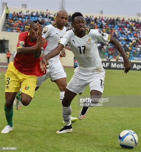 Guinea's midfielder Ibrahima Traore challenges Ghana's defender Abdul... News Photo - Getty Images