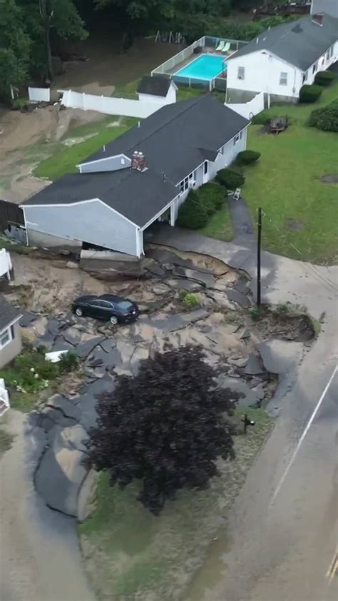 Car dealership destroyed, roads washed away: Stunning videos show ...