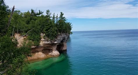 The Pictured Rocks National Lakeshore, located along the northern shor… | Pictured rocks ...