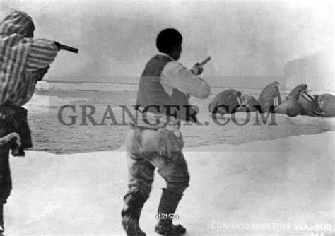 Image of ALASKA: WALRUS HUNTING. - Two Eskimo Men With Guns Raised ...