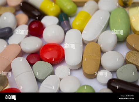 colored pills, capsules , tablets macro Stock Photo - Alamy