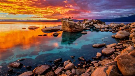 Candy colored skies sunset at shoreline of Lake Tahoe, Nevada, USA | Windows Spotlight Images