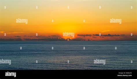 Sunset in the pacific ocean Stock Photo - Alamy