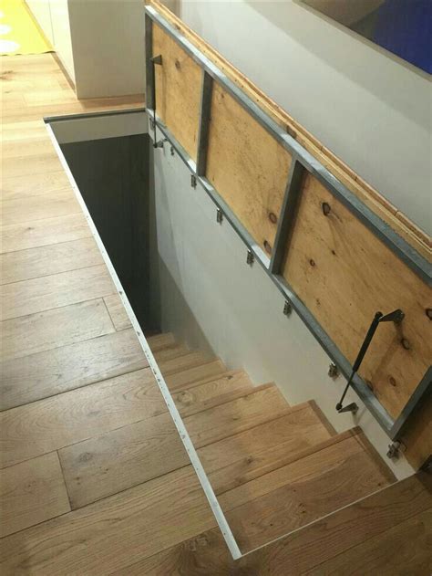 Resultado de imagen para puertas escondidas para escalera | Hidden rooms, Basement doors, Attic ...