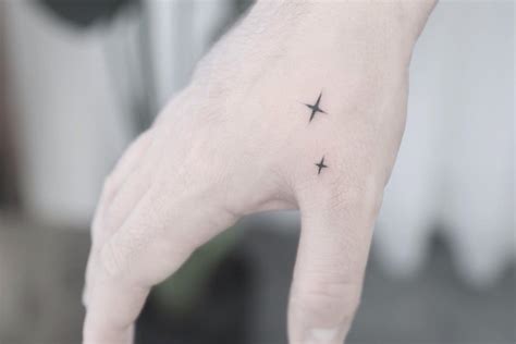 Black And Red Stars Tattoo