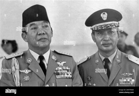 Indonesian President Sukarno, left, and Lt. Gen. Suharto, right, are ...