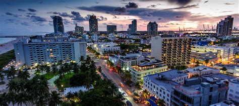 Aerial view of illuminated Ocean Drive and South beach, Miami, Florida ...