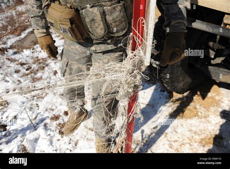 The wire from a TOW missile is secured at firing point 5 on range 19 at Fort McCoy, Wis., on ...