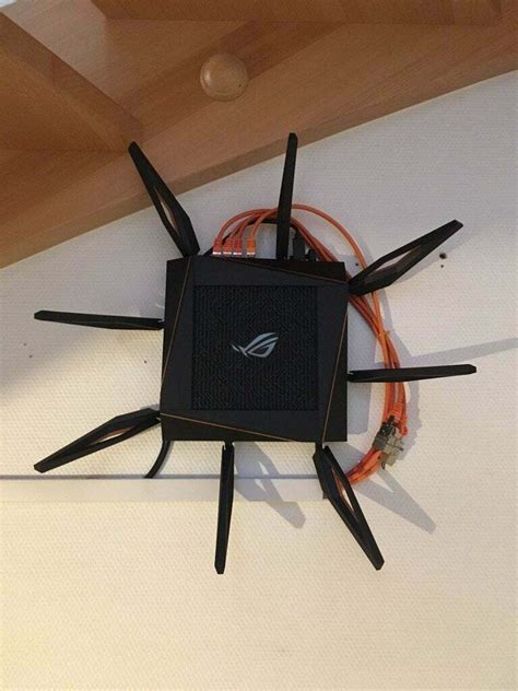 Free STL file ASUS Router Wall Mount GT-AX11000 RT-AC5300 GT-AC5300 Template・3D printable object ...