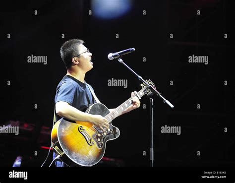 Beijing, China. 23rd May, 2014. Folk ballad singer Li Zhi performs ...