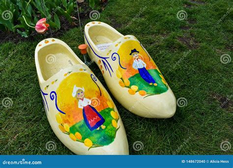 Clogs Painted with Dutch People and Tulips Stock Photo - Image of festival, traditional: 148672040