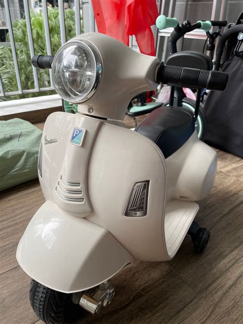 Vespa electric scooter, Babies & Kids, Infant Playtime on Carousell