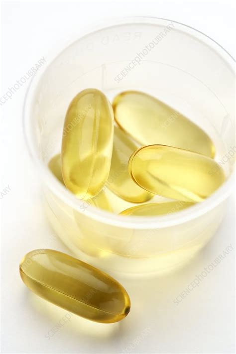 Fish oil capsules - Stock Image - C002/5223 - Science Photo Library