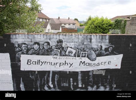 Murals dedicated to the 1971 Ballymurphy Massacre seen on a wall in ...