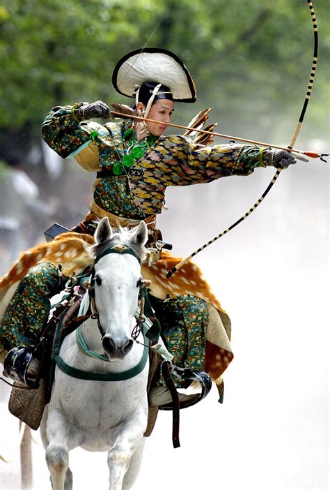 AWMA Blog | An archer in ancient samurai warrior uniform ridin