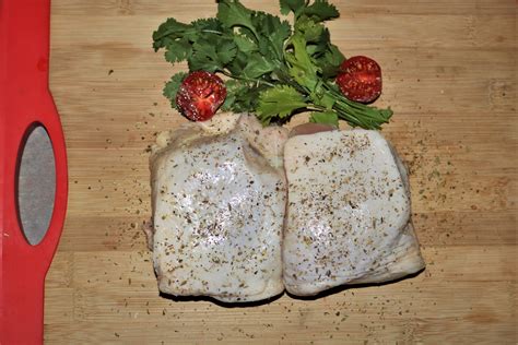 Raw Chicken Thighs On Cutting Board Free Stock Photo - Public Domain Pictures