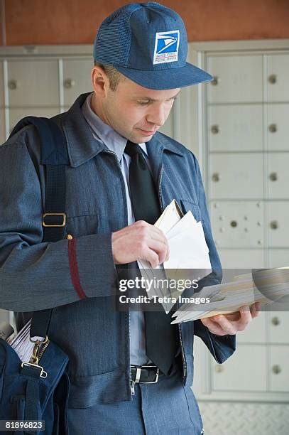 6,503 Postman Uniform Stock Photos, High-Res Pictures, and Images ...