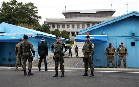 North Korean soldier shot as he makes rare defection across one of ...