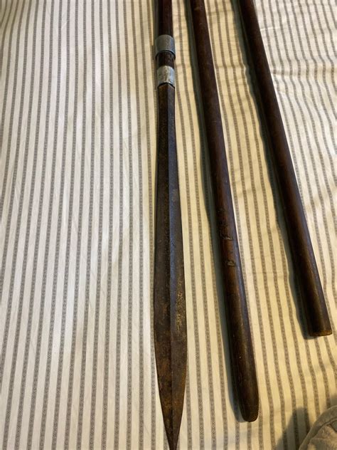 Help identifying this type of spear/origin. The story is my grandfather cut this up to fit in a ...