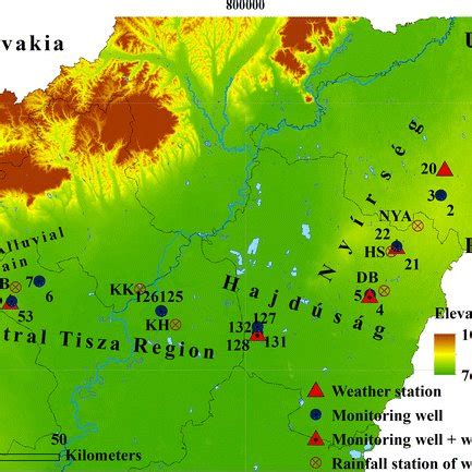 Location of water table monitoring wells, weather stations and the ...