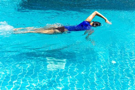 Female Swimmer Training in the Swimming Pool. Stock Photo - Image of ...