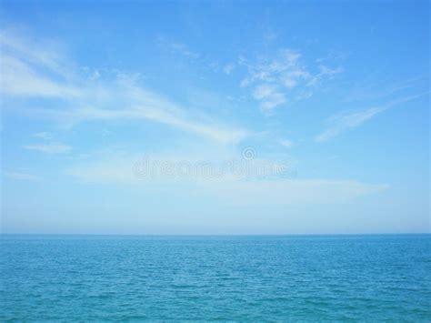 Blue Sea and Sky Horizon with Clouds Stock Image - Image of water, peaceful: 13140185