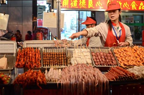 Chinese street cooking editorial stock image. Image of food - 34427674