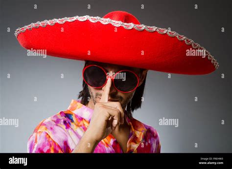 Young mexican man wearing sombrero Stock Photo - Alamy