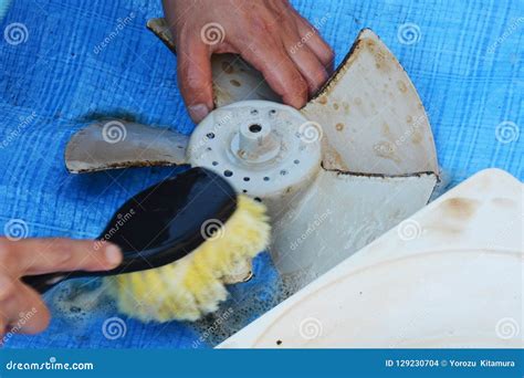 Cleaning of the Kitchen Exhaust Fan Stock Photo - Image of dirty, furniture: 129230704