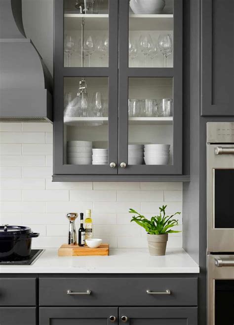 Dark gray kitchen cabinets featured in Centered by Design's Bucktown ...