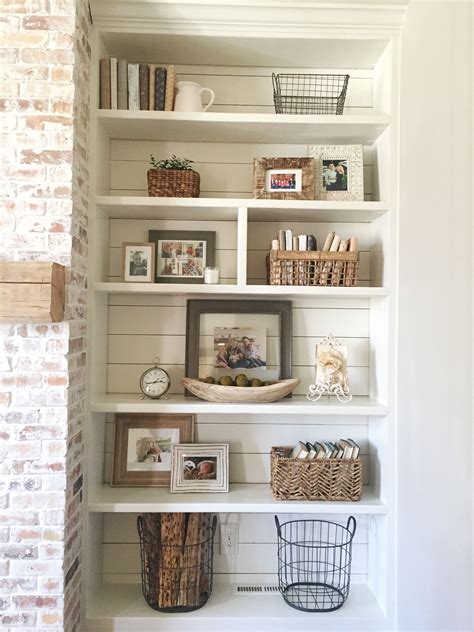 Built-in bookshelves styling and decor, shiplap, whitewash brick fireplace, rustic mantle ...