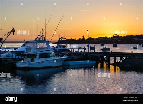 Fishing boats and pleasure craft moored at Coffin Bay wharf Coffin Bay South Australia Stock ...