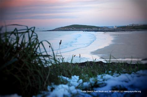 Photos of Snow in Newquay, Cornwall - Snow on Fistral beach - Newquay Surfer