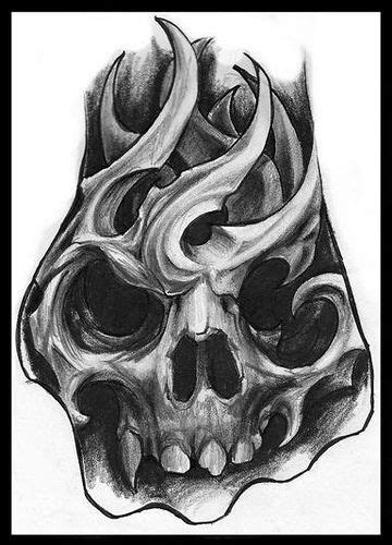 Skull Hand Tattoo Designs