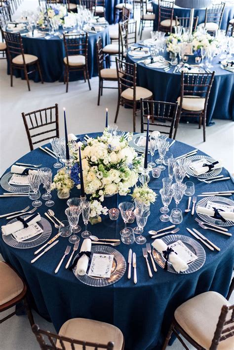 Stunning tables at this crystal and blue themed wedding | Blue themed wedding, Blue silver ...