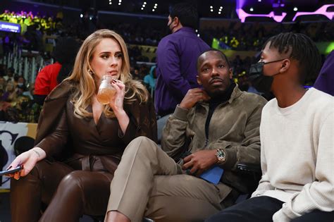 Adele goes glam in Louis Vuitton at NBA game with Rich Paul