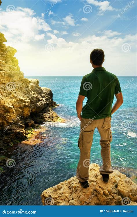 Man in cave stock photo. Image of coastline, grotto, peaceful - 15983468