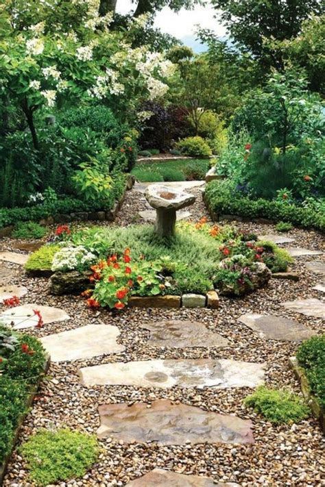 Large flagstone pavers, surrounded by pea gravel, create a rustic, winding path | Walkway ...