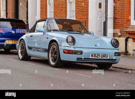 Porsche 911 Carrera 4 Cabriolet in Baby Blue 3.6L Stock Photo - Alamy