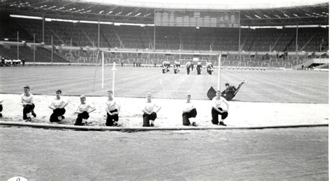 Photograph of a number of boys appearing inside Wembley Stadium, 1966; photograp... | eHive