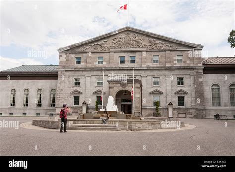 A Photo with Rideau Hall Main Entrance. A pair of tourists photograph ...