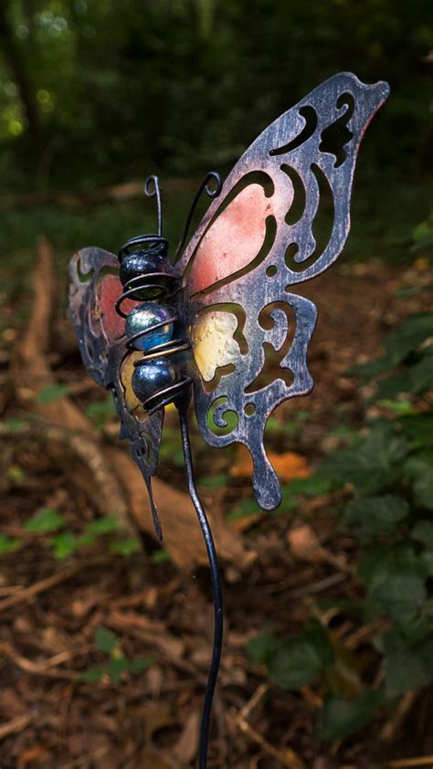Metal butterfly | Look down! Art found on the forest floor. … | Flickr