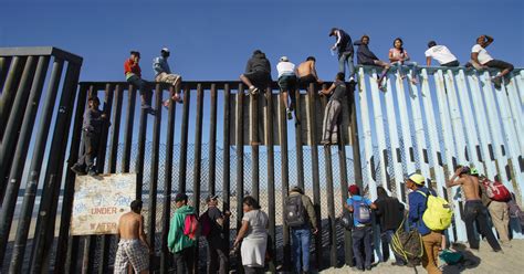 Migrants fill Tijuana shelters, more on way to US border