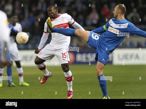 Stuttgart's Arthur Boka and Genk's Thomas Buffel fight for the ball ...