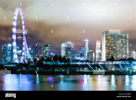 Singapore skyline at night Stock Photo - Alamy